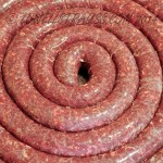 A coil of venison sausage